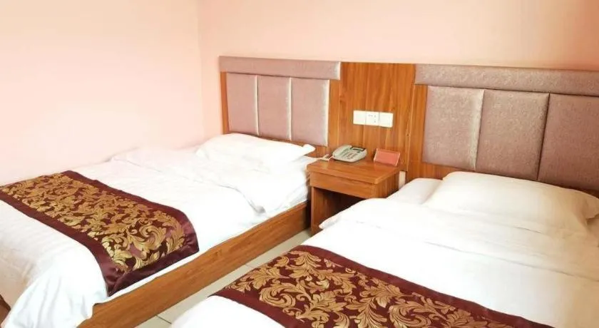 Bed in 169 Business Hotel