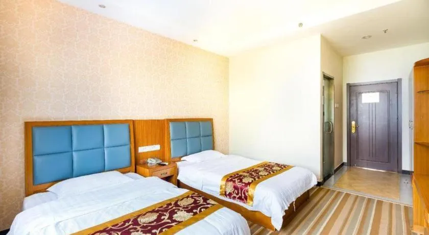 Bed in 169 Business Hotel