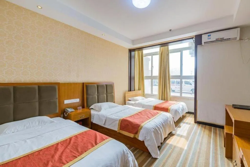 Bed in 169 Business Hotel