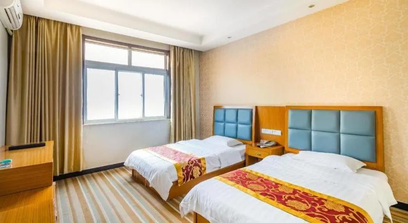 Bed in 169 Business Hotel