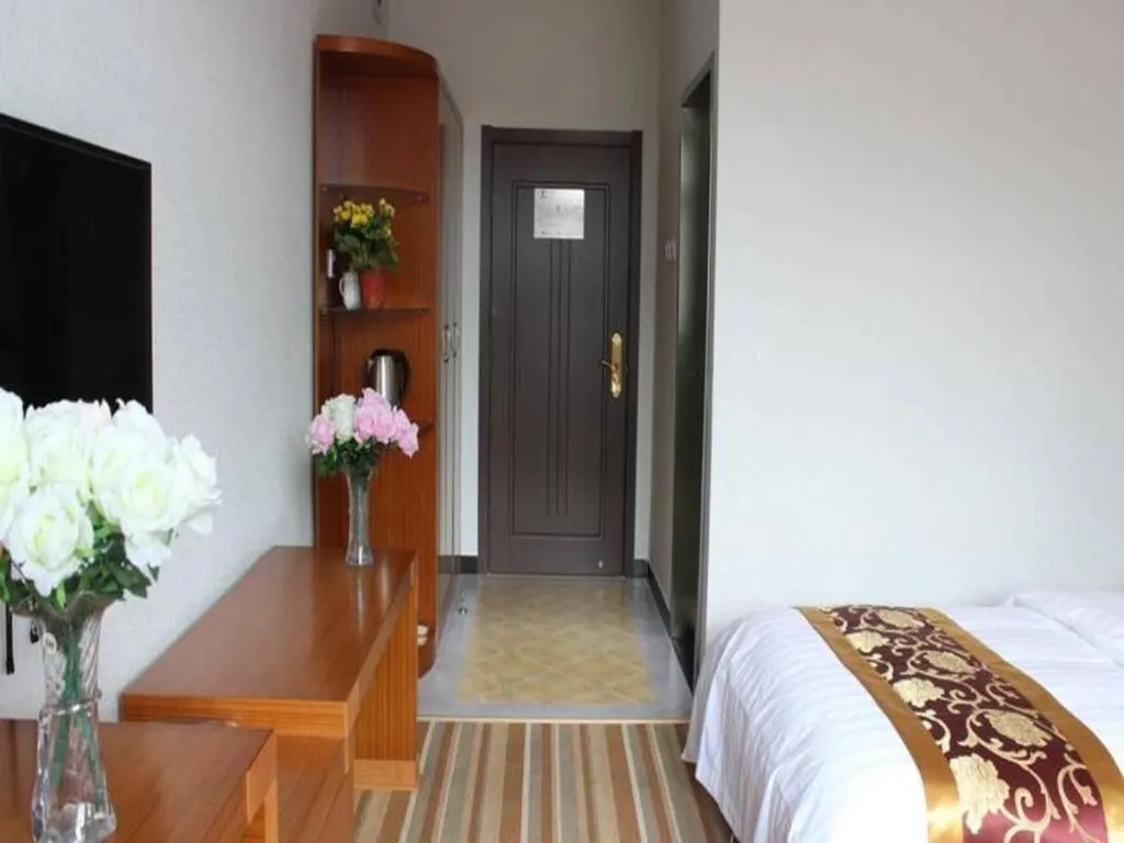 Bed in 169 Business Hotel