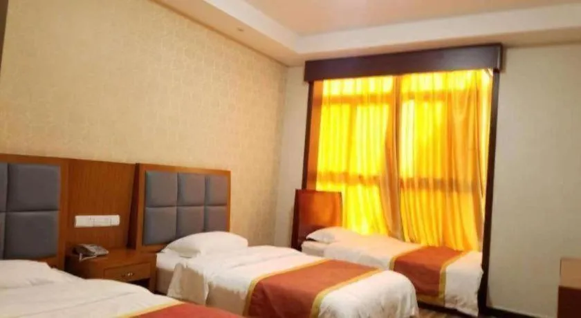 Bed in 169 Business Hotel