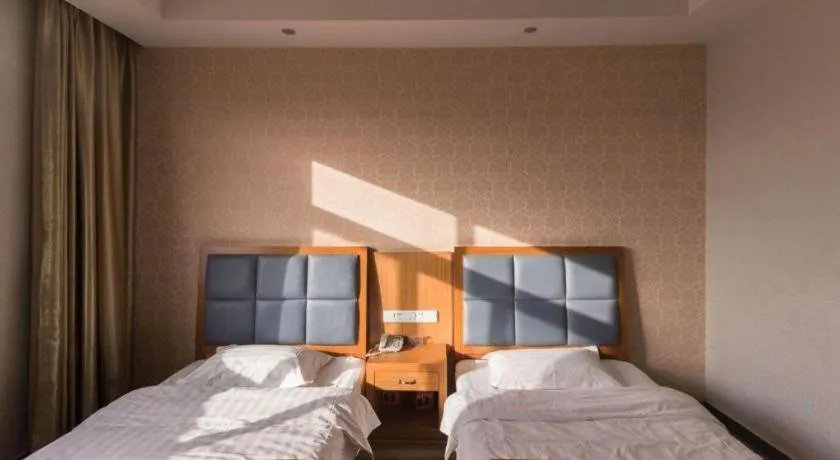 Bed in 169 Business Hotel