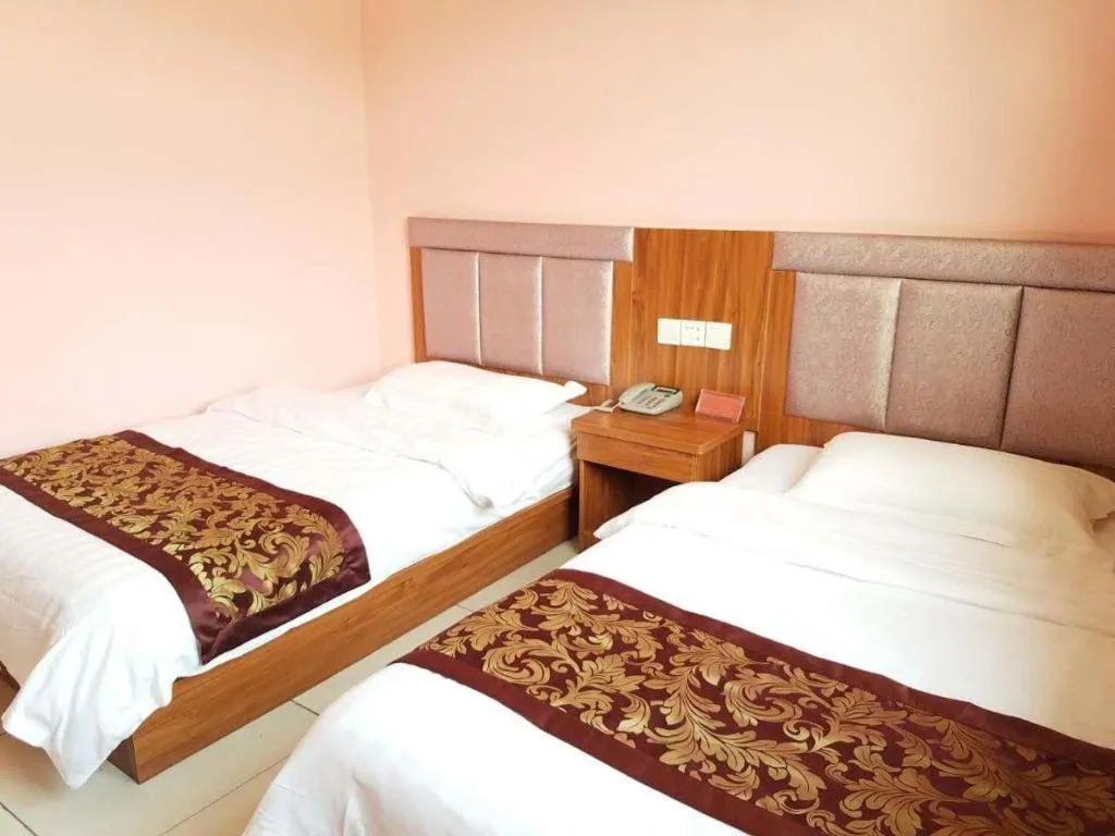 Bed in 169 Business Hotel