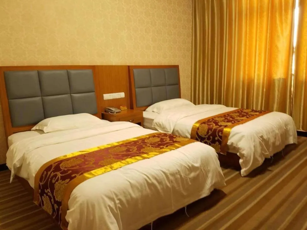 Bed in 169 Business Hotel