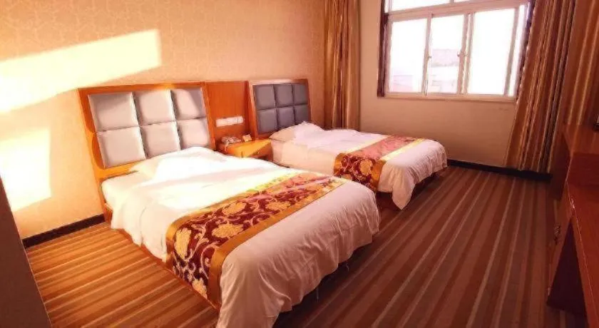 Bed in 169 Business Hotel