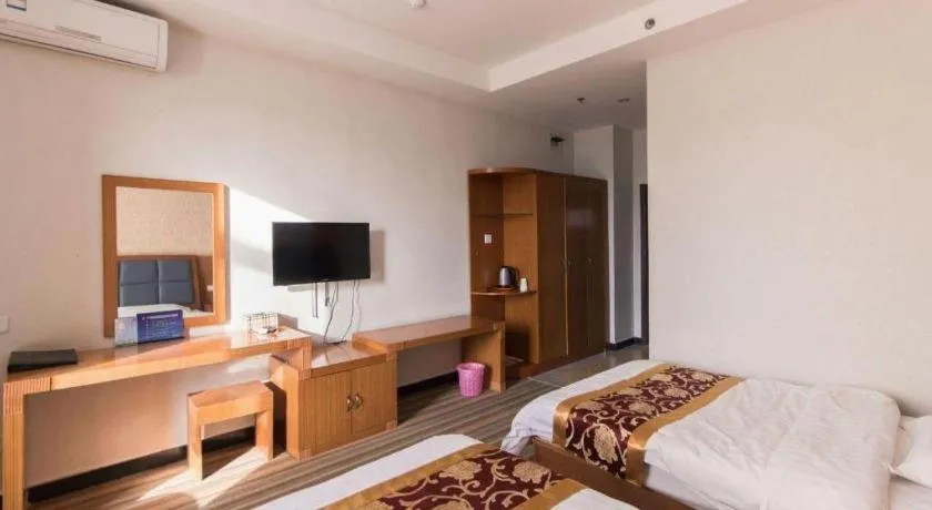 Bed in 169 Business Hotel