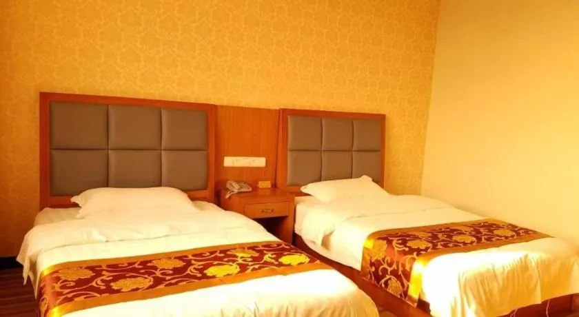 Bed in 169 Business Hotel