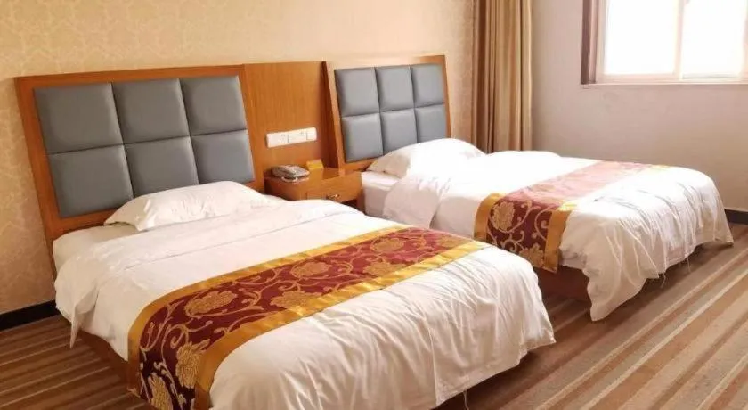 Bed in 169 Business Hotel