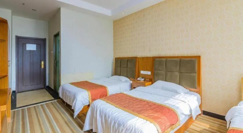 Bed in 169 Business Hotel