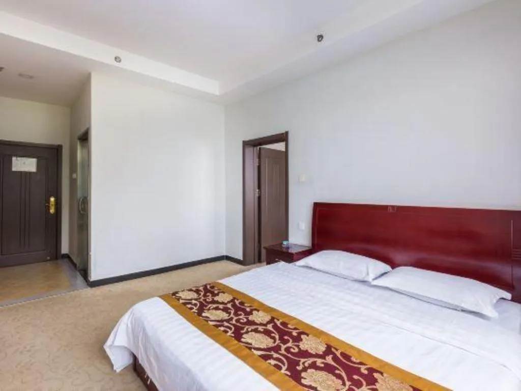 Bed in 169 Business Hotel