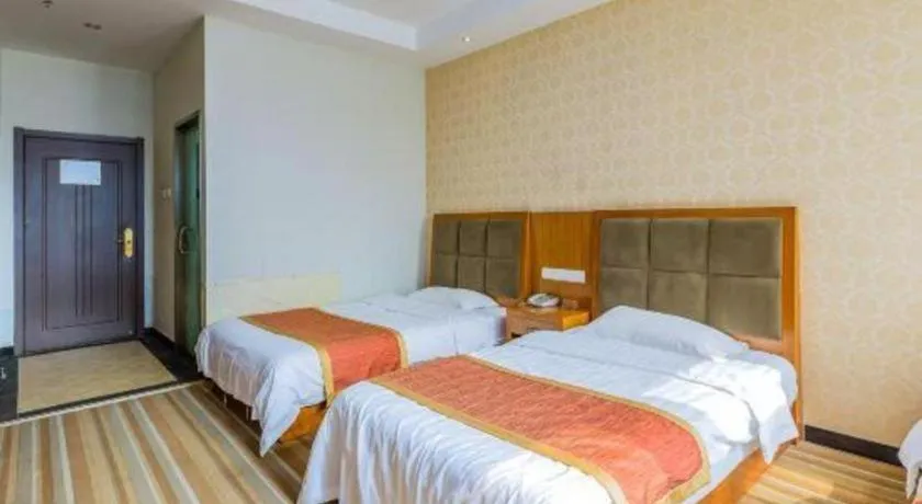 Bed in 169 Business Hotel