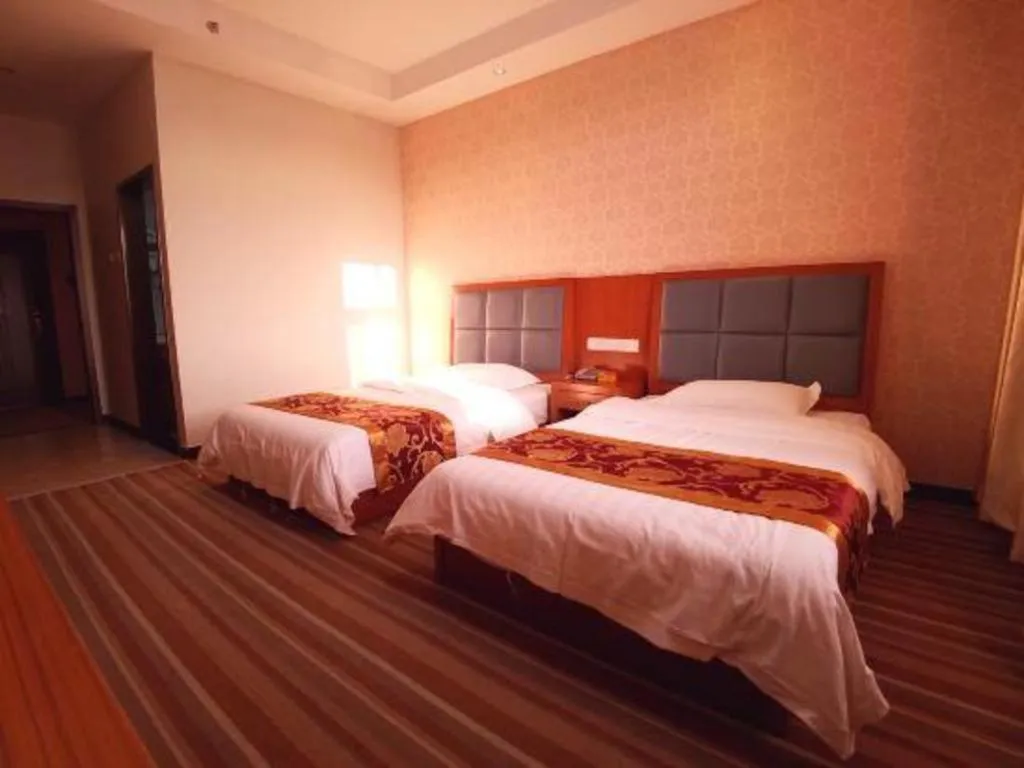 Bed in 169 Business Hotel