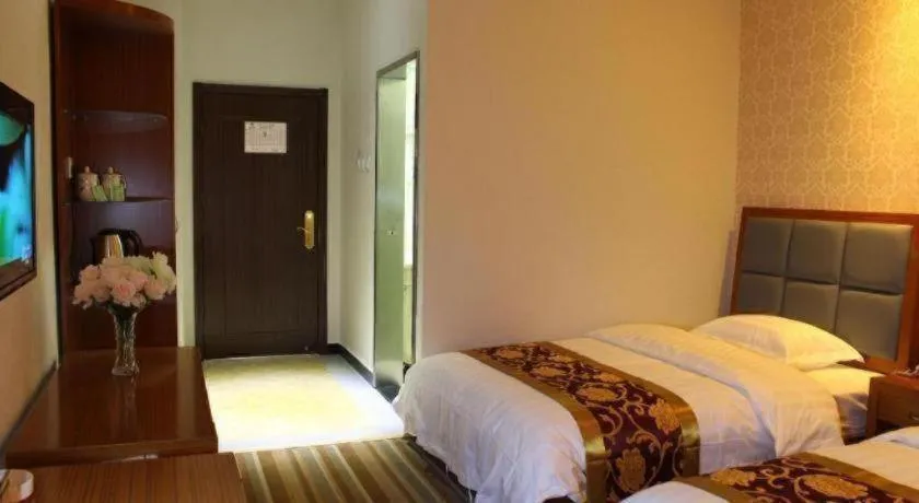 Bed in 169 Business Hotel