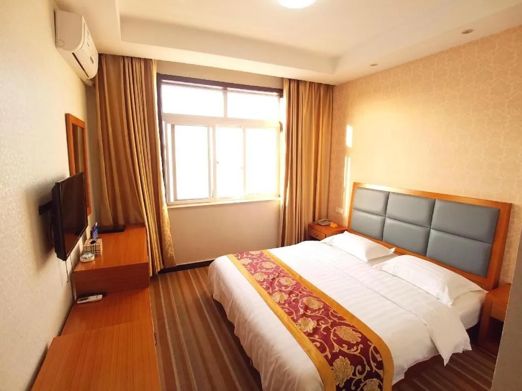 Bed in 169 Business Hotel