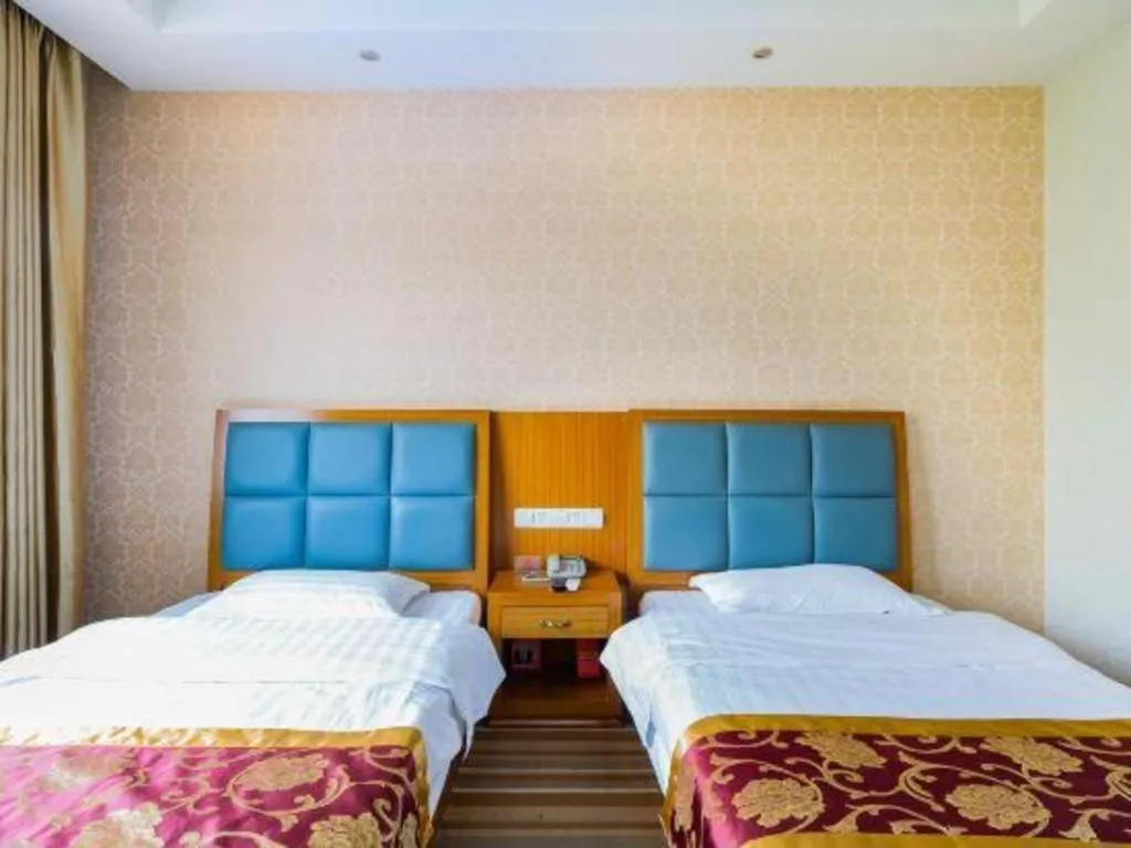 Bed in 169 Business Hotel