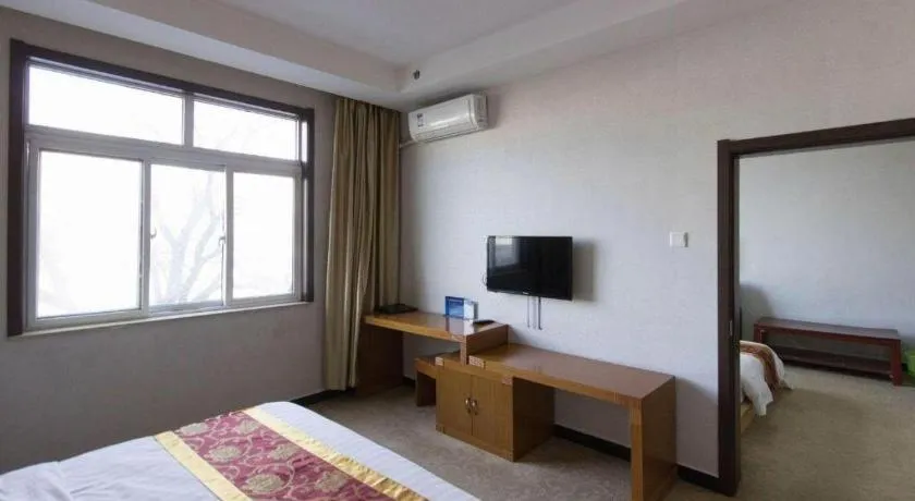 Bed in 169 Business Hotel