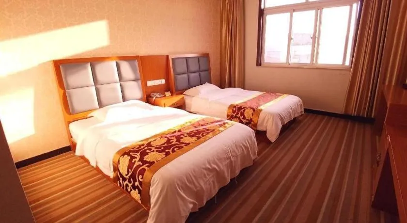 Bed in 169 Business Hotel