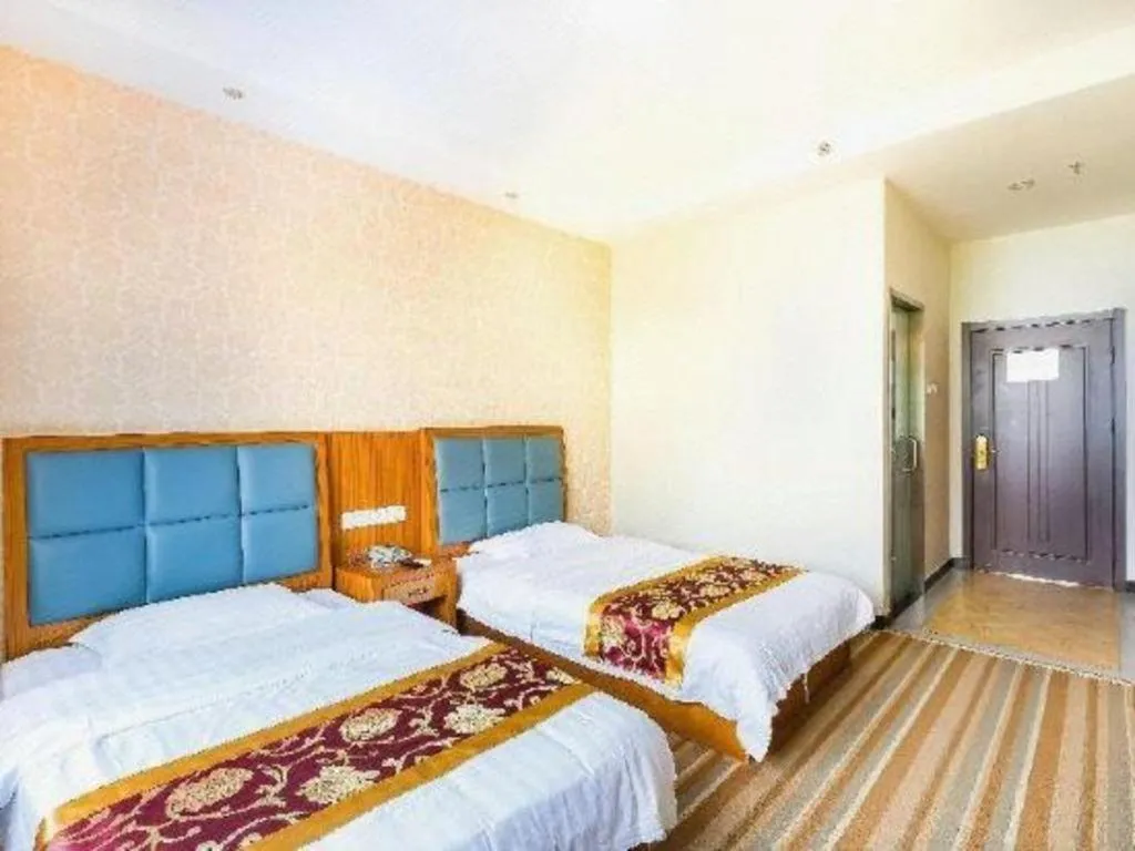 Bed in 169 Business Hotel