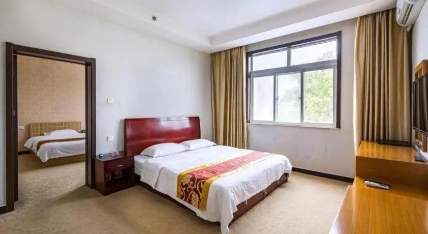 Bed in 169 Business Hotel