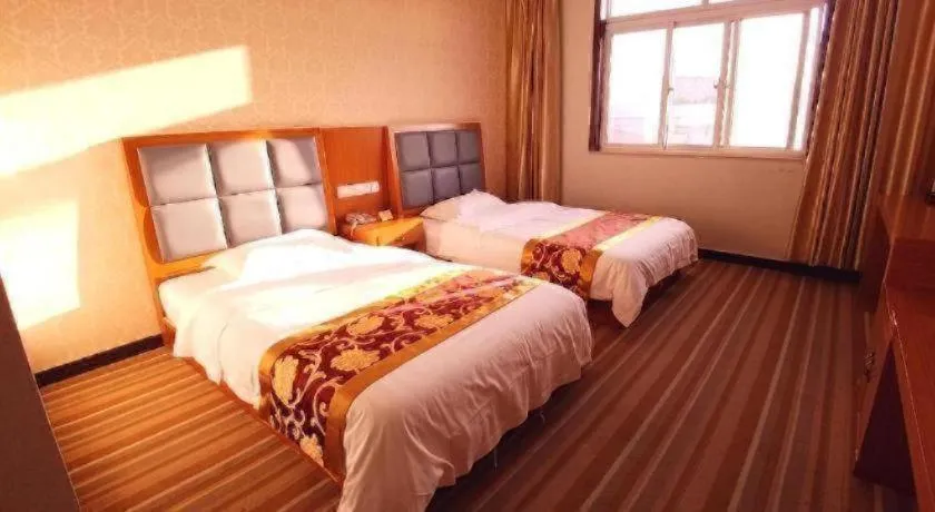 Bed in 169 Business Hotel