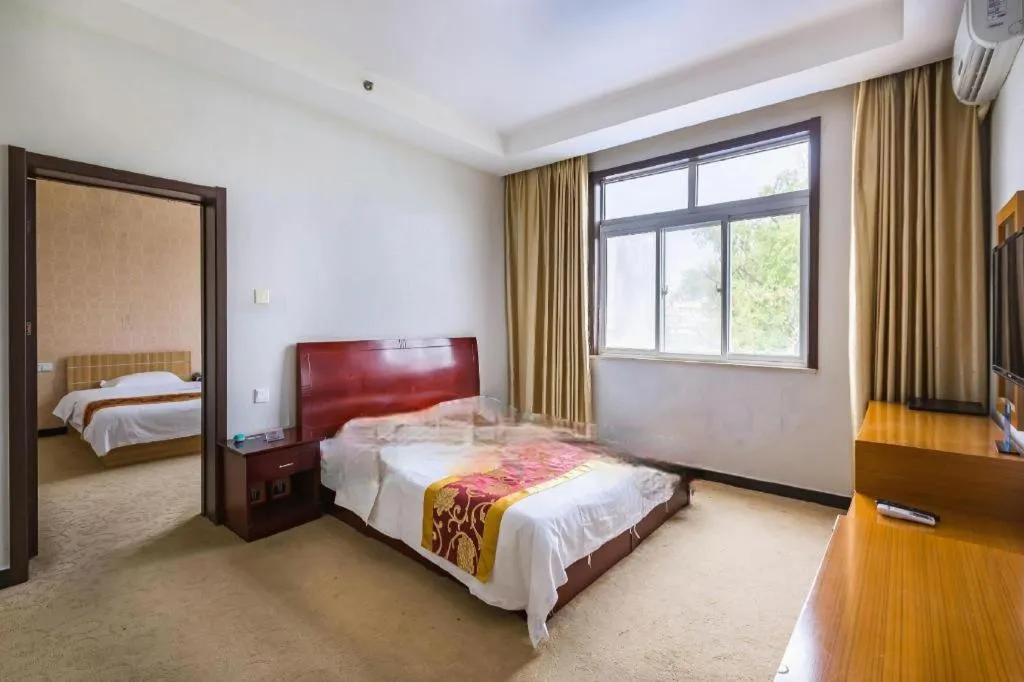 Bed in 169 Business Hotel