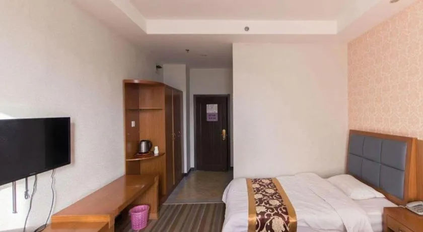 Bed in 169 Business Hotel