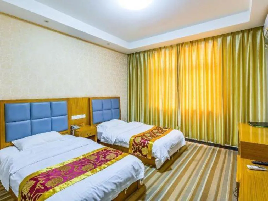 Bed in 169 Business Hotel