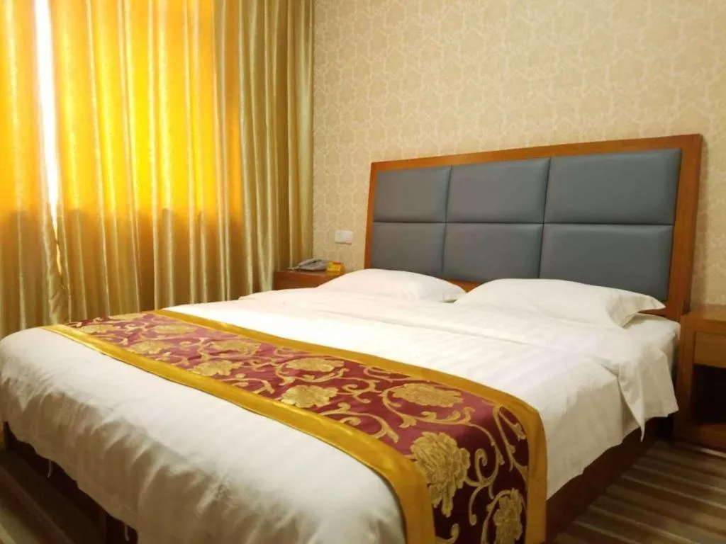 Bed in 169 Business Hotel