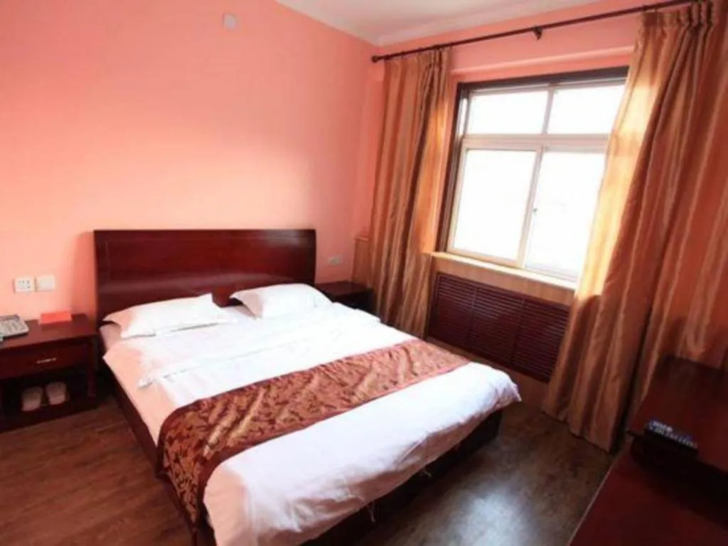 Bed in 169 Business Hotel