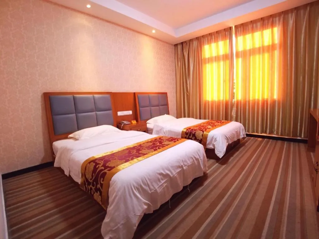 Bed in 169 Business Hotel