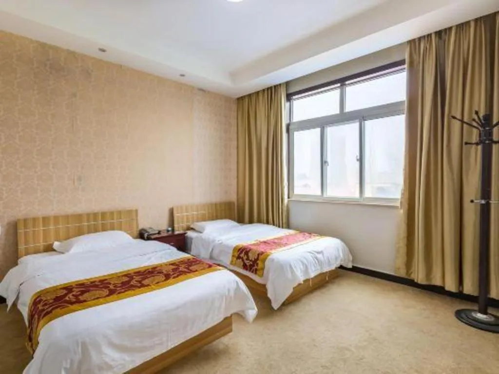 Bed in 169 Business Hotel