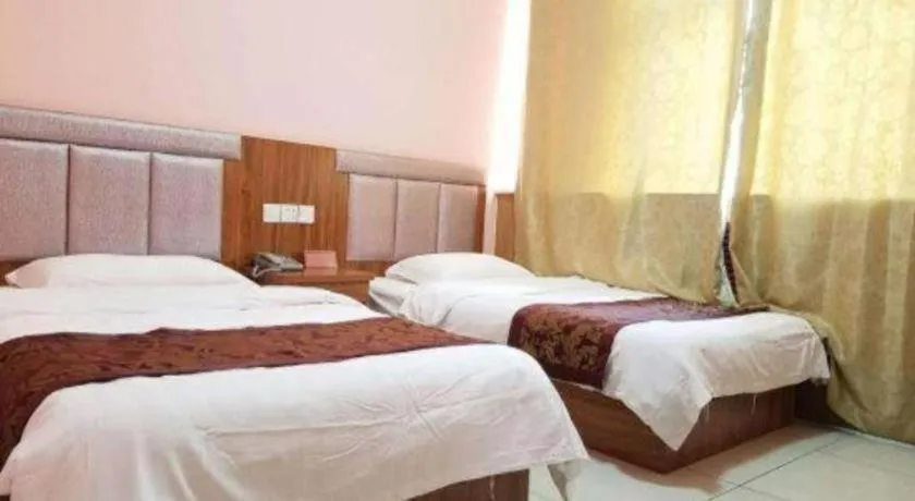 Bed in 169 Business Hotel