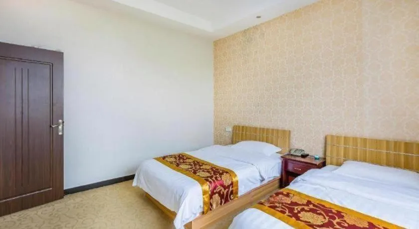 Bed in 169 Business Hotel