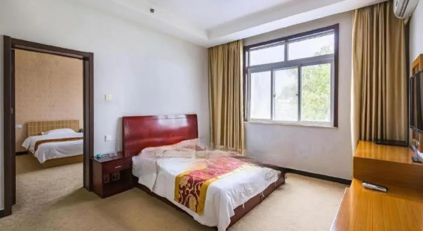 Bed in 169 Business Hotel