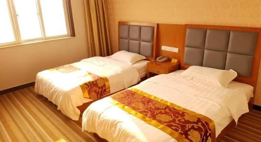 Bed in 169 Business Hotel