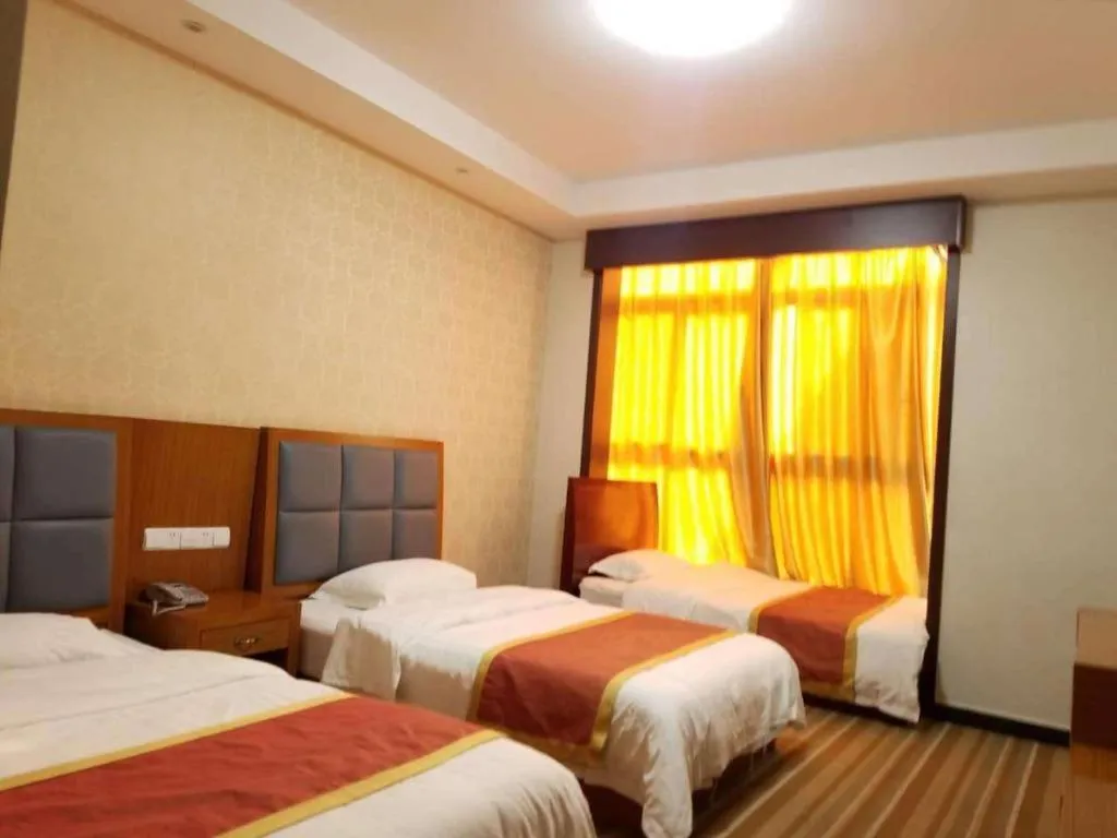 Bed in 169 Business Hotel