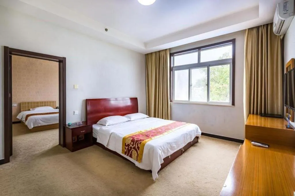 Bed in 169 Business Hotel