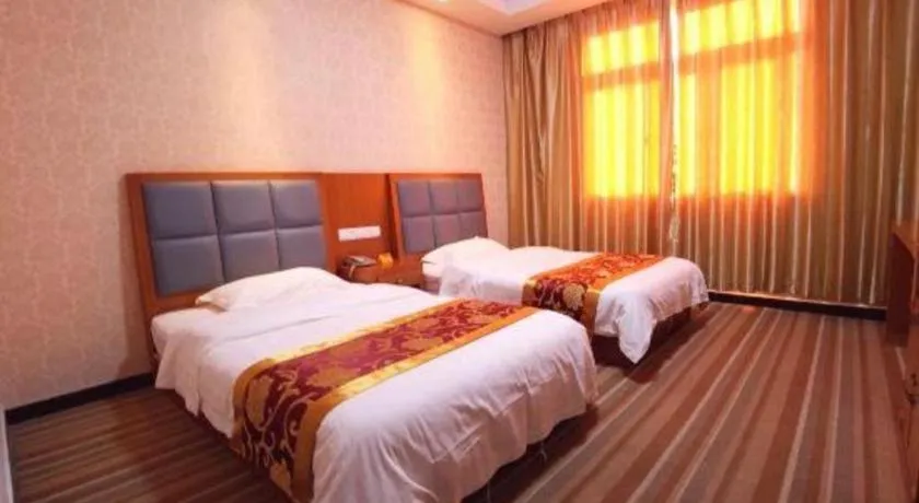 Bed in 169 Business Hotel