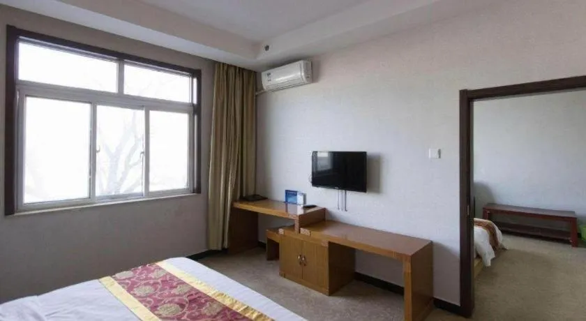 Bed in 169 Business Hotel