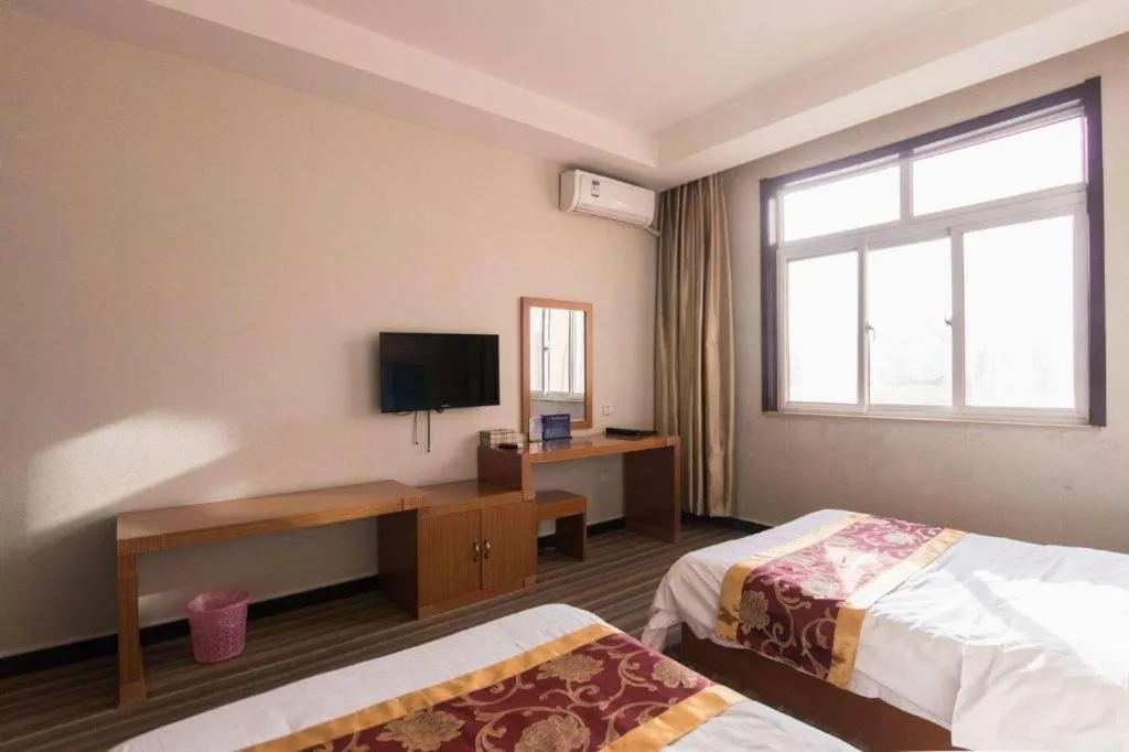 Bed in 169 Business Hotel