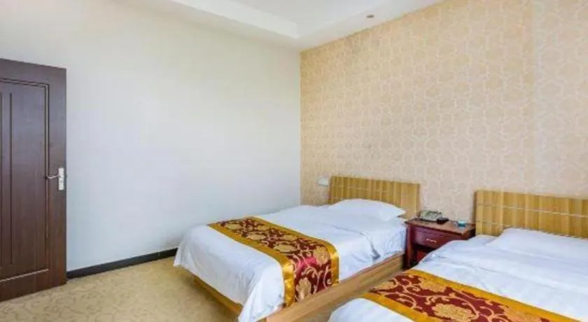 Bed in 169 Business Hotel