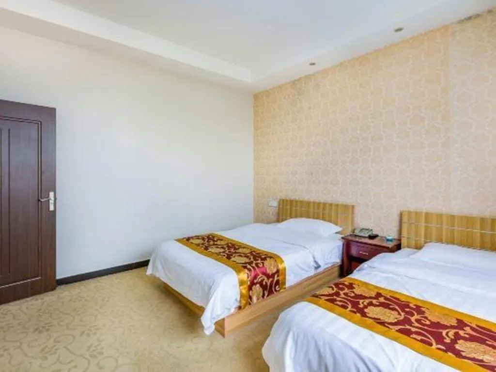 Bed in 169 Business Hotel