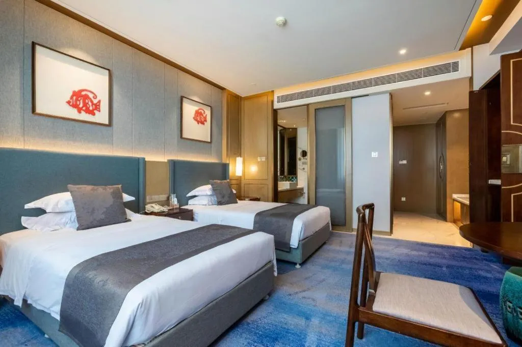 Bed in Bliss International Hotel Weihai