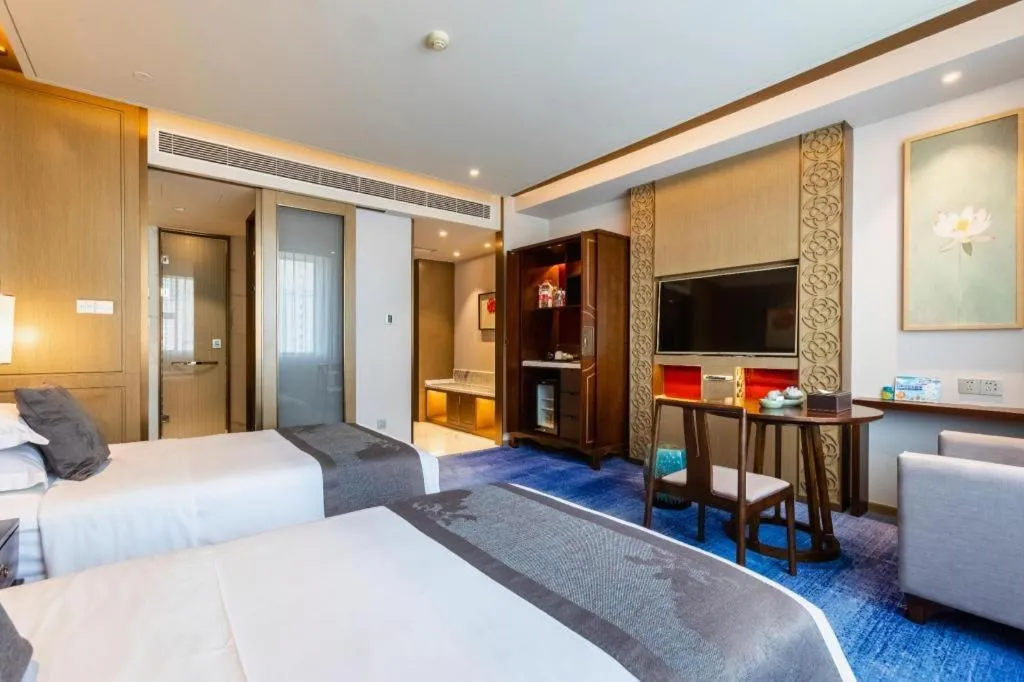 Bed in Bliss International Hotel Weihai