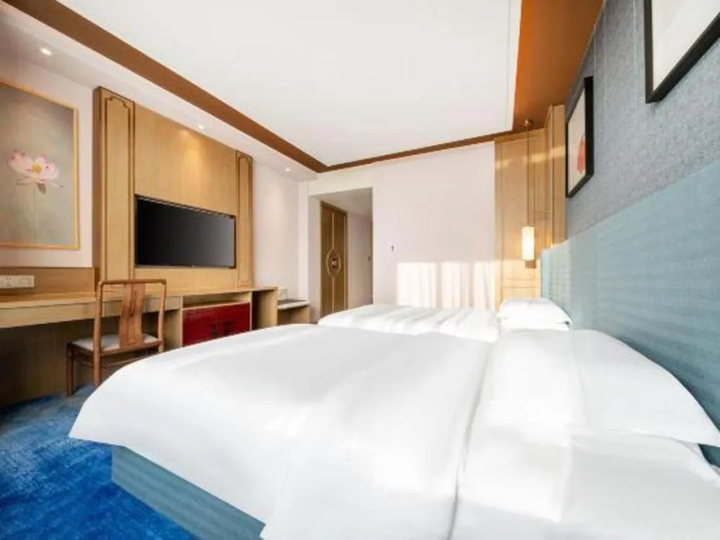 Bed in Bliss International Hotel Weihai