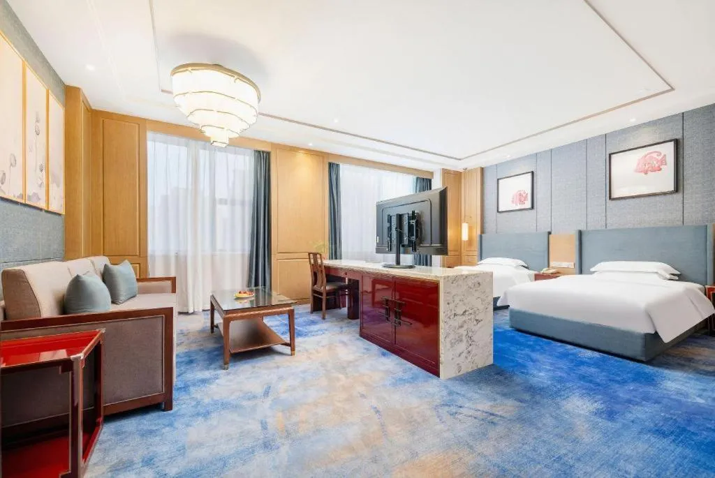 Bed in Bliss International Hotel Weihai