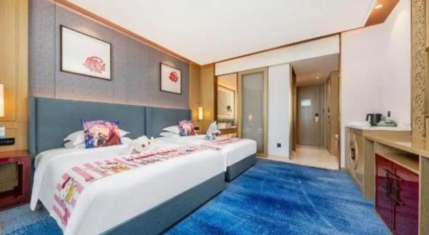 Bed in Bliss International Hotel Weihai