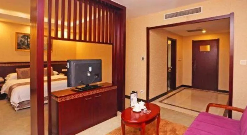 Bed in Bliss International Hotel Weihai