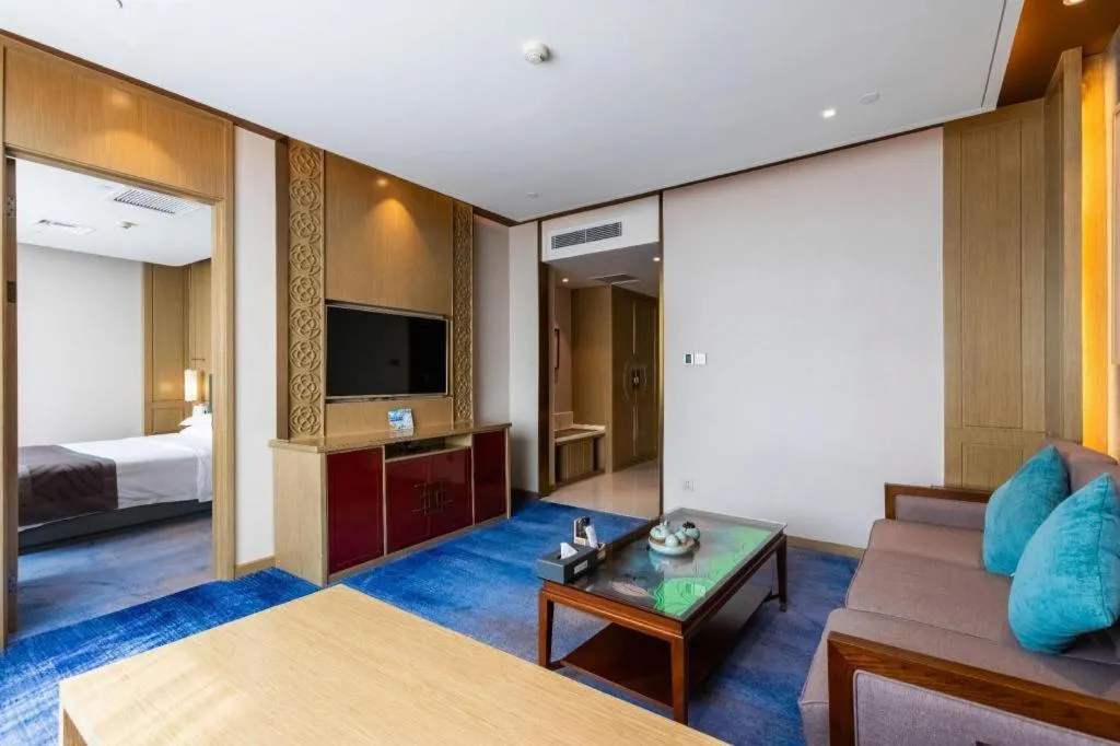 Bed in Bliss International Hotel Weihai